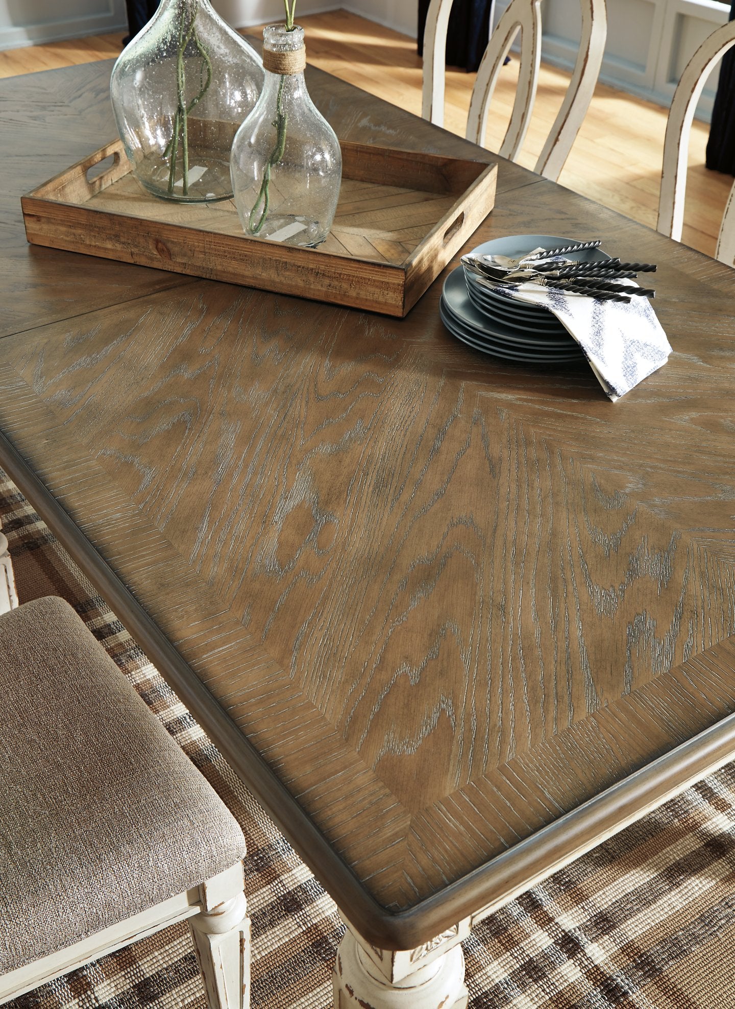 Realyn Dining Extension Table Half Price Furniture