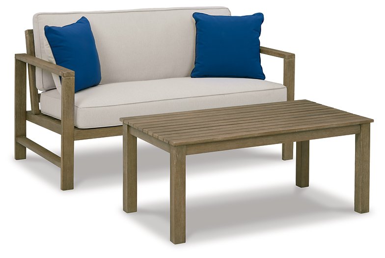 Fynnegan Outdoor Loveseat with Table (Set of 2) Half Price Furniture