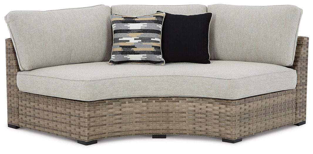 Calworth Outdoor Curved Loveseat with Cushion Half Price Furniture