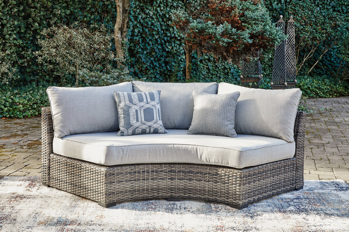 Harbor Court Curved Loveseat with Cushion Half Price Furniture