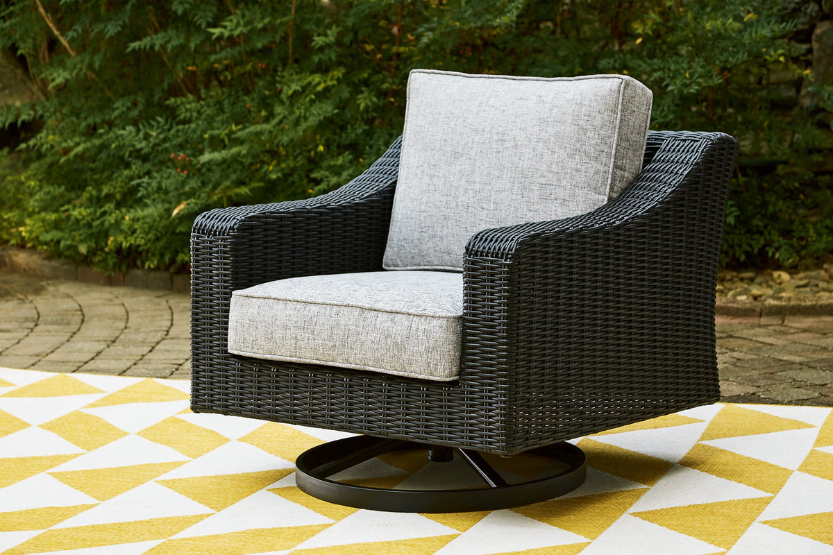 Beachcroft Outdoor Swivel Lounge with Cushion  Las Vegas Furniture Stores