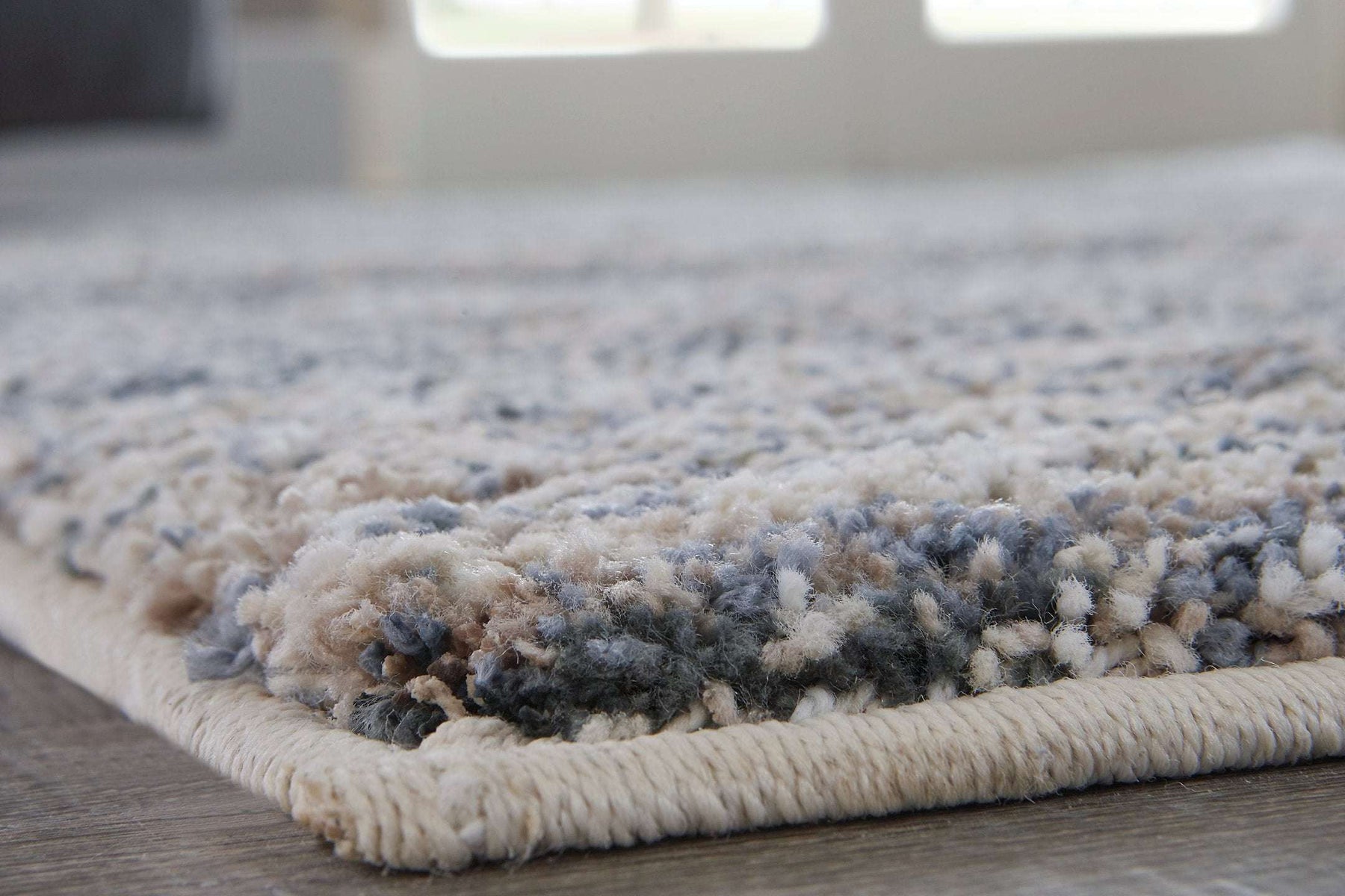 Marnin 7'10" x 10' Rug Half Price Furniture