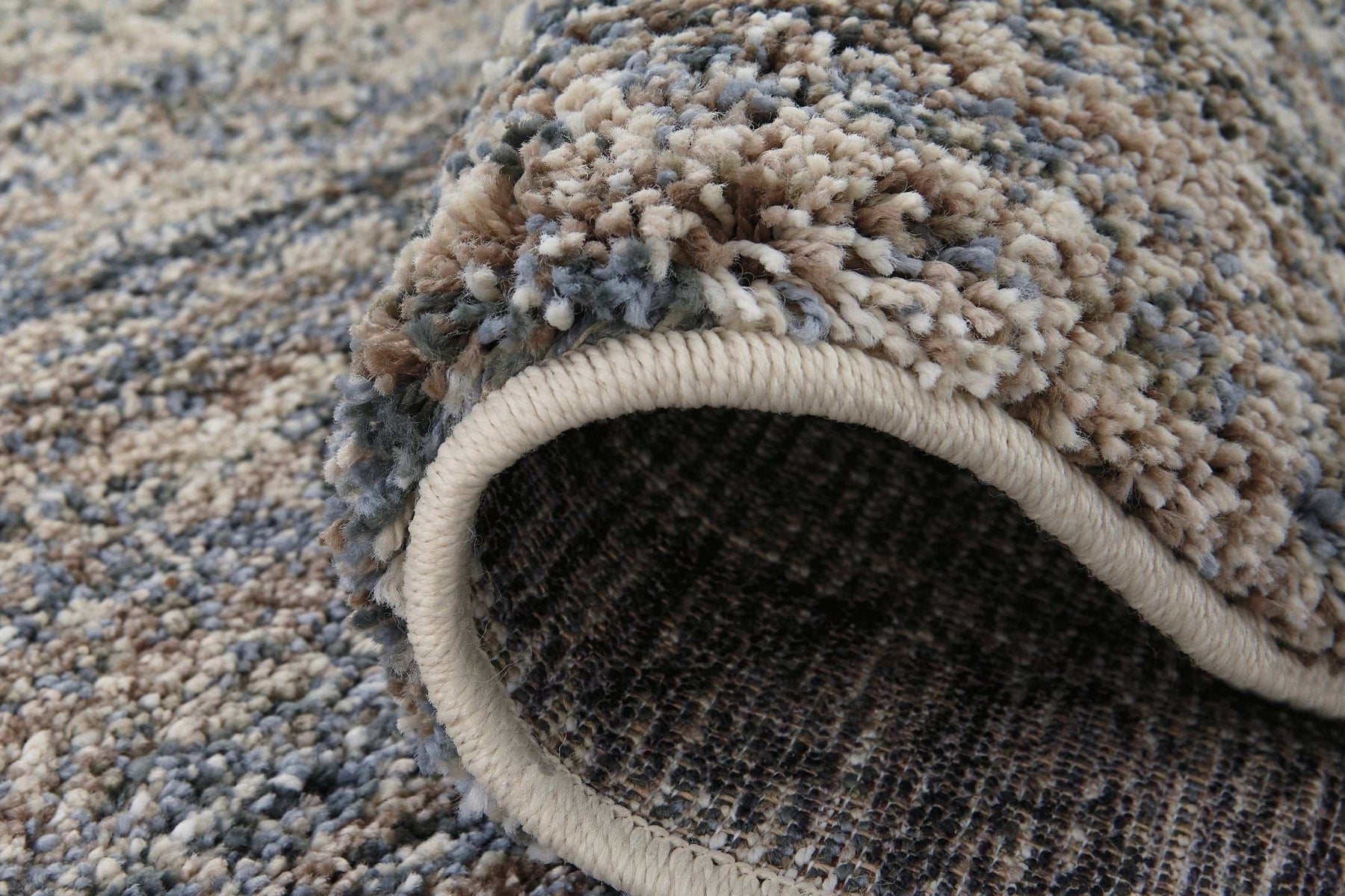 Marnin 7'10" x 10' Rug Half Price Furniture