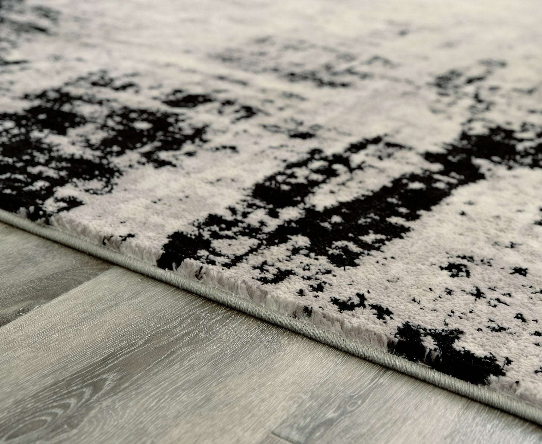 Zekeman 7'10" x 10' Rug Half Price Furniture
