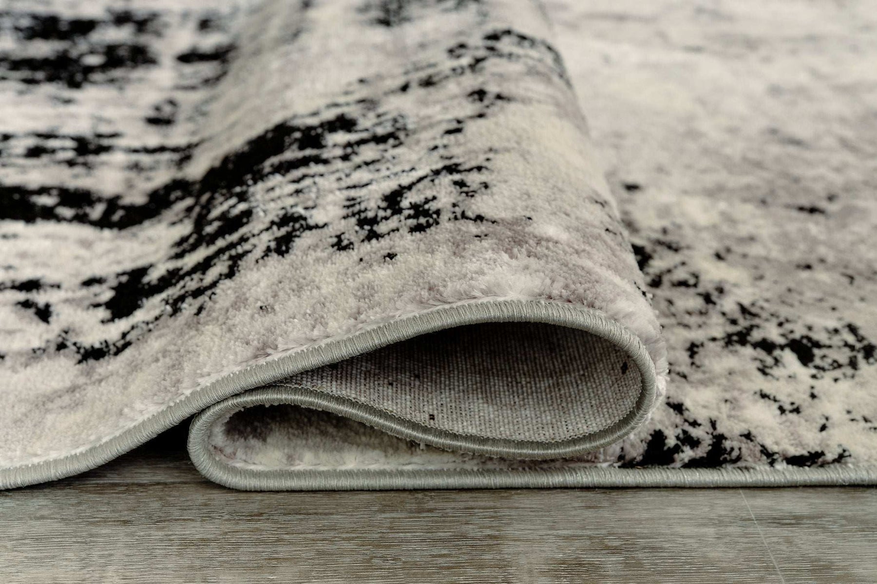 Zekeman 7'10" x 10' Rug Half Price Furniture