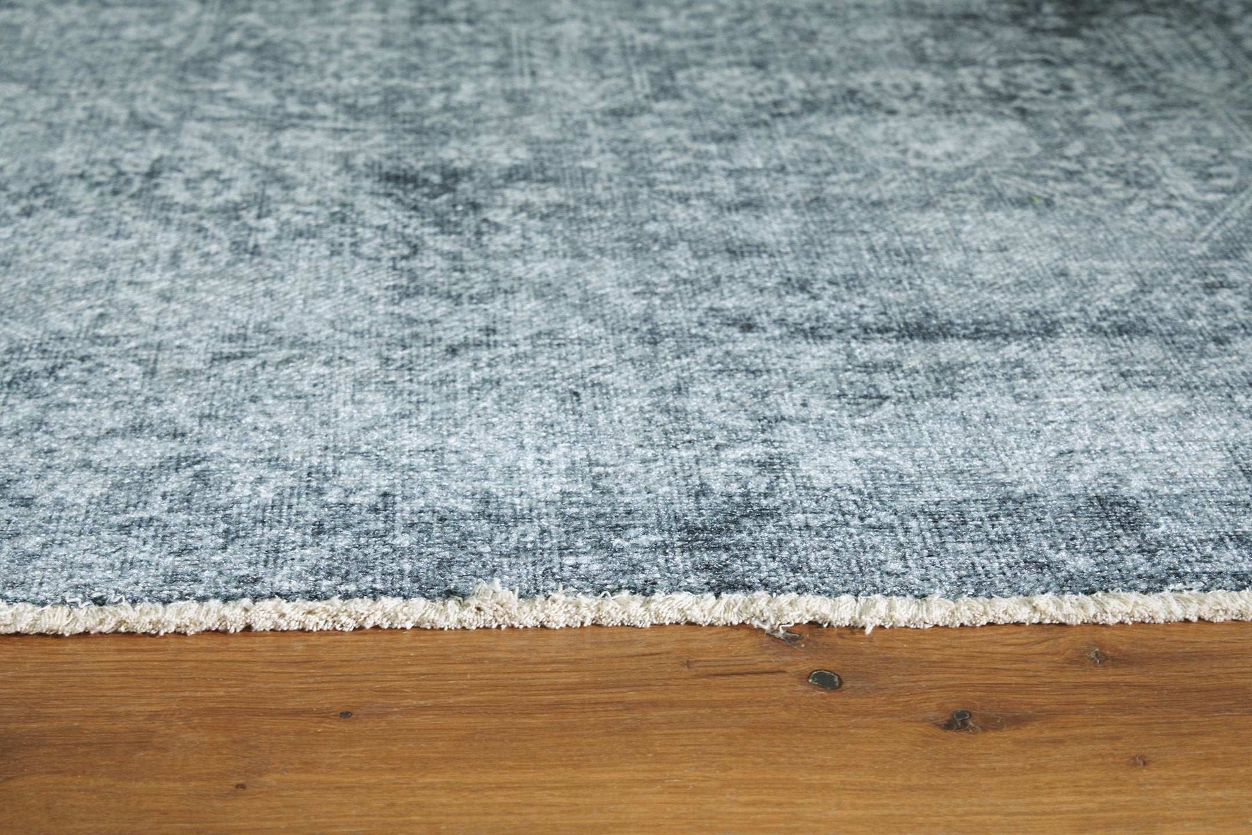 Rhysill 5' x 7' Rug Half Price Furniture