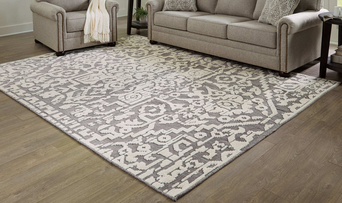 Oddetteley 7'10" x 10'1" Rug Half Price Furniture