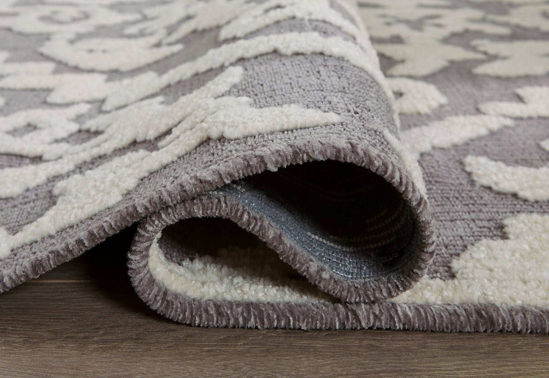 Oddetteley 7'10" x 10'1" Rug Half Price Furniture