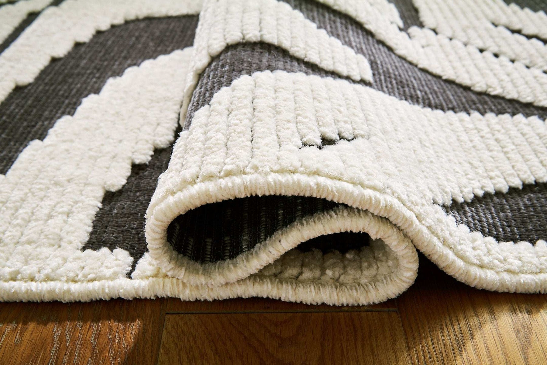 Thomwith 7'10" x 10'1" Rug Half Price Furniture