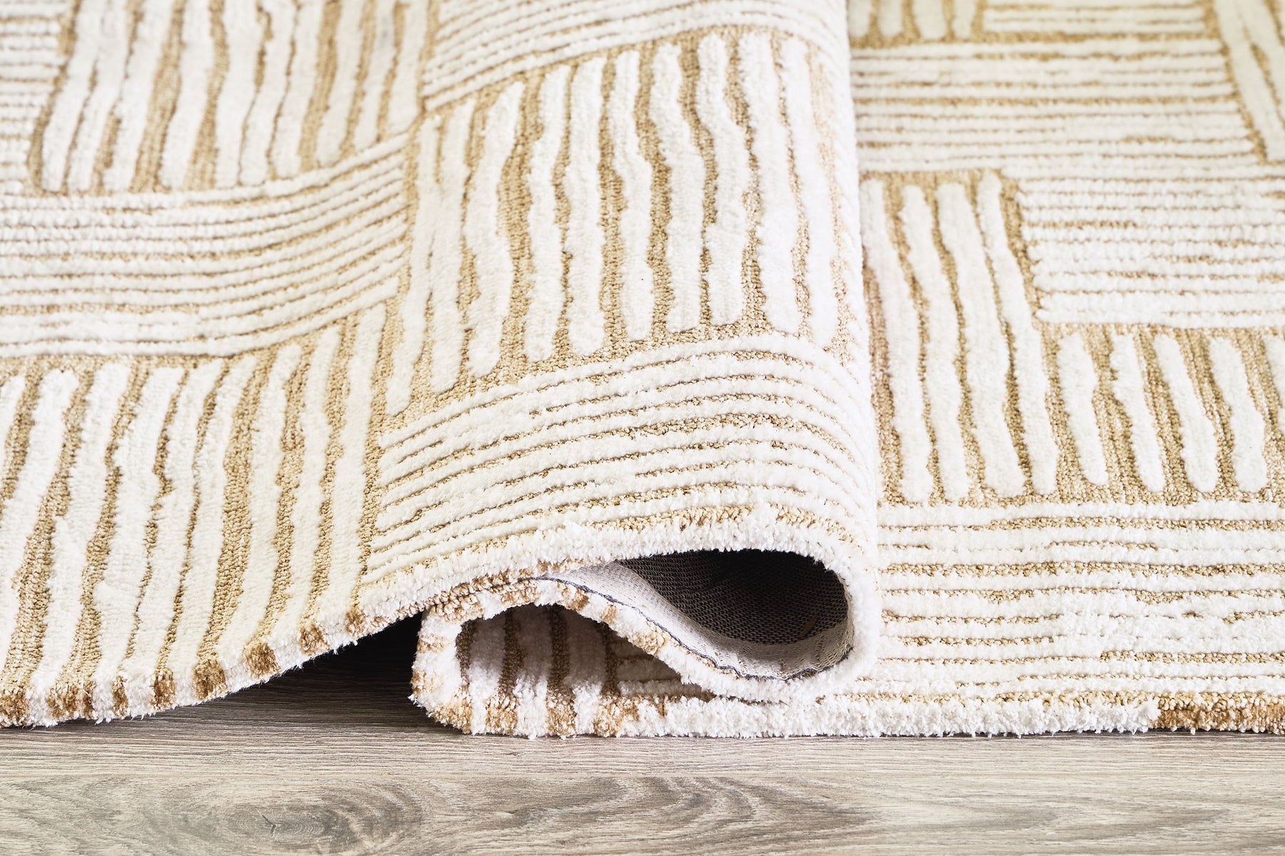 Adanmund 5' x 7' Rug - Rug - Half Price Furniture