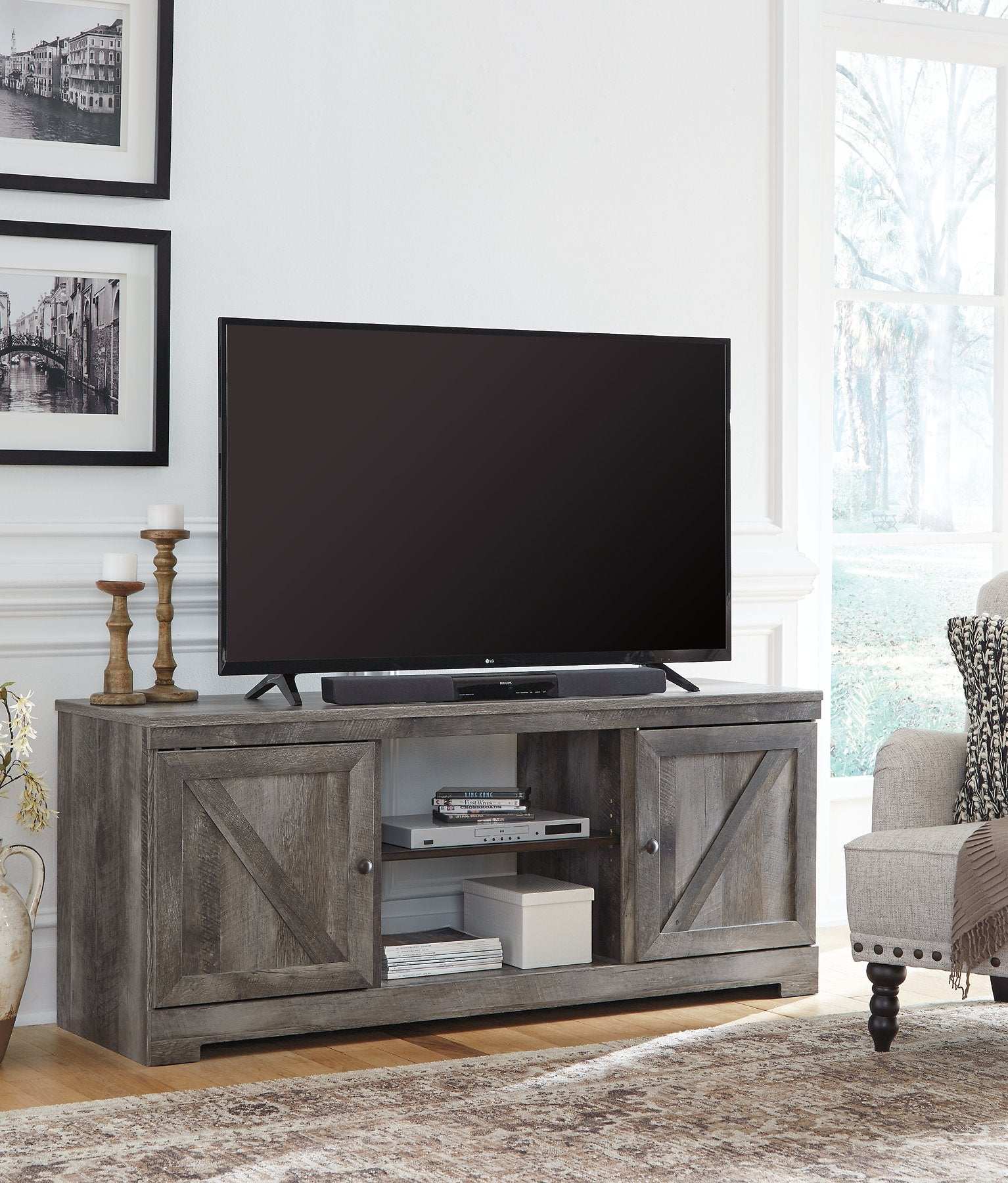 Wynnlow 4-Piece Entertainment Center Half Price Furniture