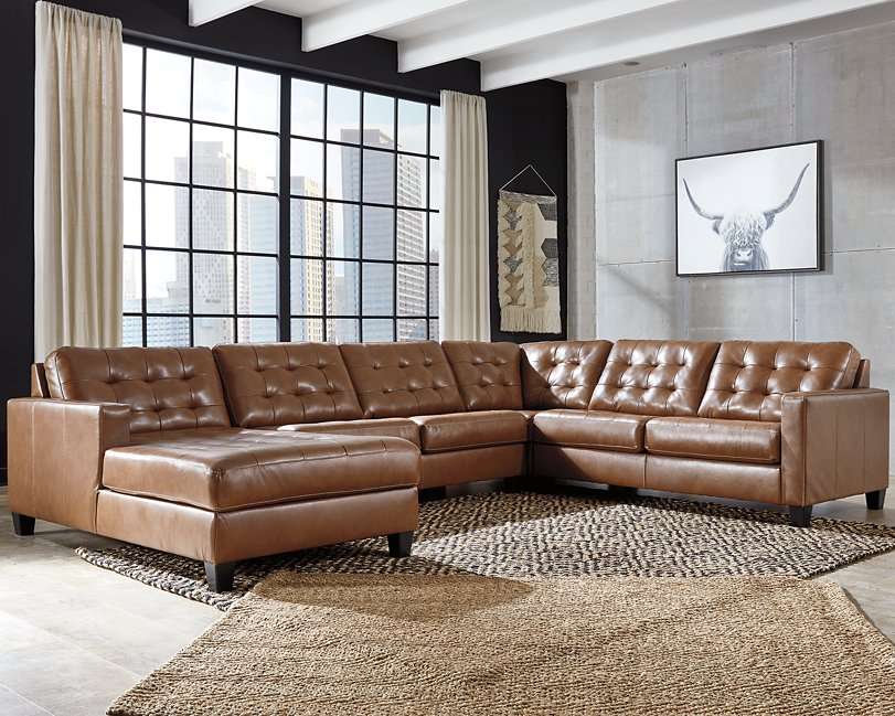 Baskove Sectional with Chaise Half Price Furniture