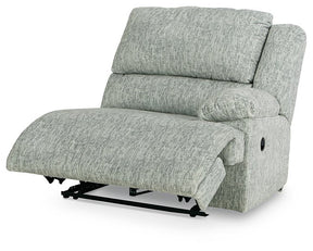 McClelland Reclining Sectional Loveseat with Console Half Price Furniture