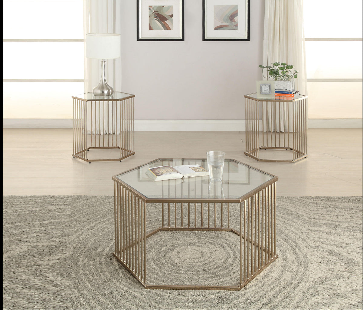 Oaklie Champagne & Clear Glass Coffee Table  Las Vegas Furniture Stores