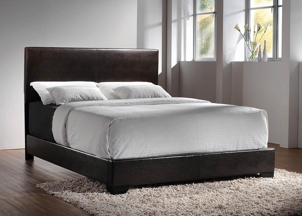 Conner Eastern King Upholstered Panel Bed Dark Brown - Half Price Furniture
