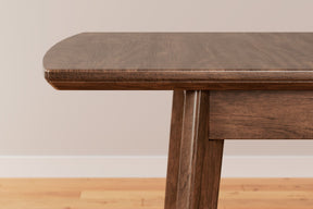 Lyncott Dining Extension Table - Half Price Furniture