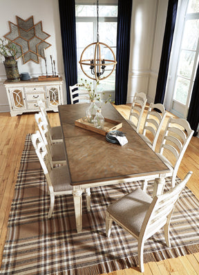 Realyn Dining Extension Table Half Price Furniture