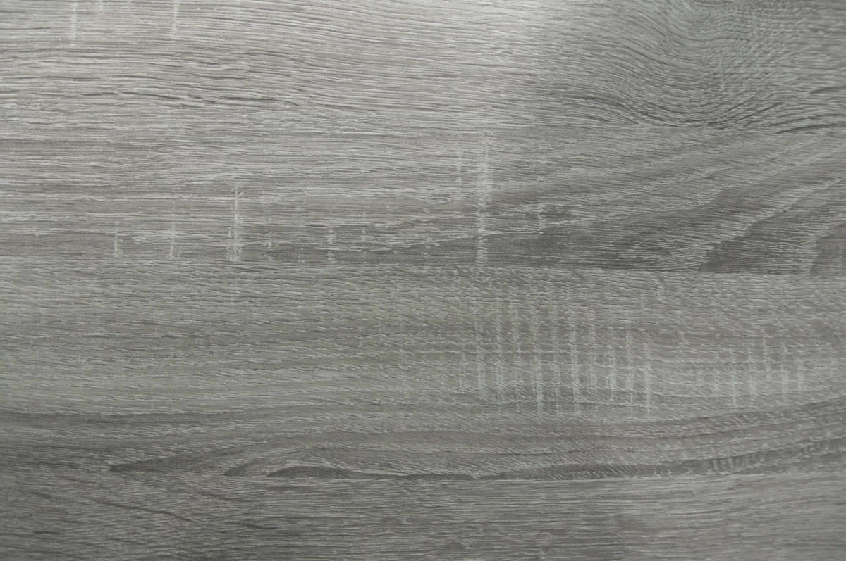 Close-up of light grey wood grain tabletop finish