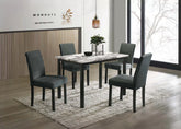5 Pc faux marble dining set with 4 charcoal upholstered chairs in a dining room