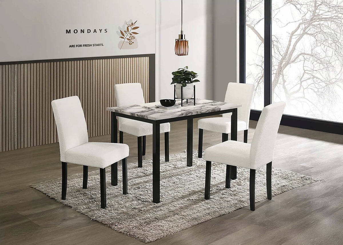 5 Pc faux marble dining set with 4 white upholstered chairs in a dining room