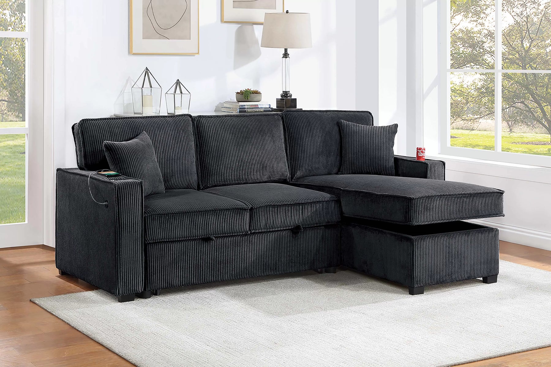 Black corduroy convertible sectional with reversible storage chaise