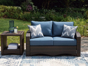 Windglow Outdoor Loveseat with Cushion - Half Price Furniture