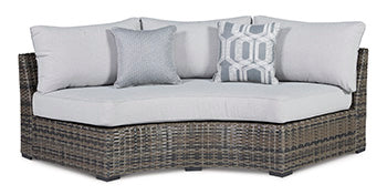 Harbor Court Curved Loveseat with Cushion - Half Price Furniture