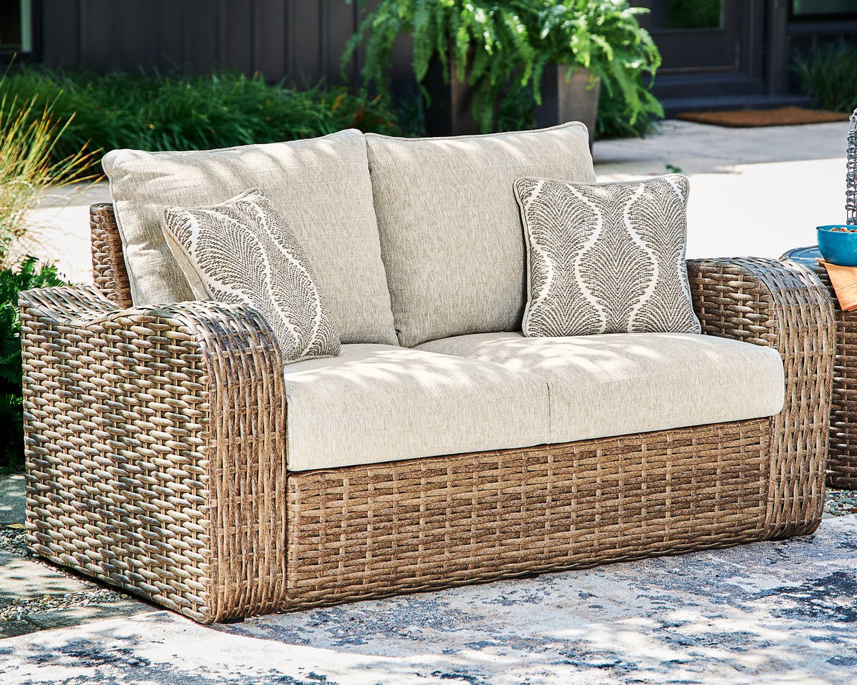 Sandy Bloom Outdoor Loveseat with Cushion  Half Price Furniture