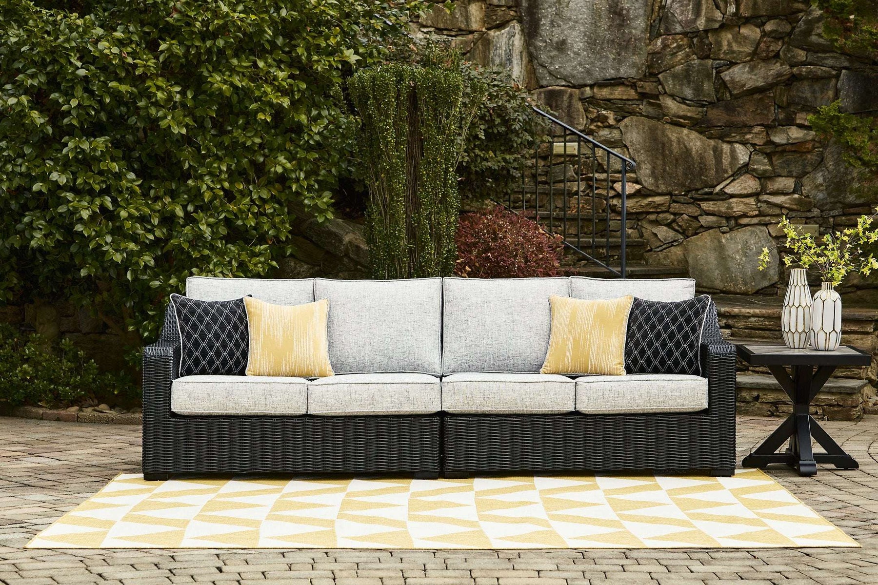 Beachcroft 2-Piece Outdoor Loveseat with Cushion Half Price Furniture