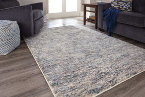 Marnin 7'10" x 10' Rug Half Price Furniture