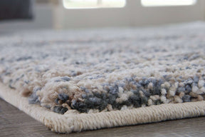 Marnin 7'10" x 10' Rug Half Price Furniture