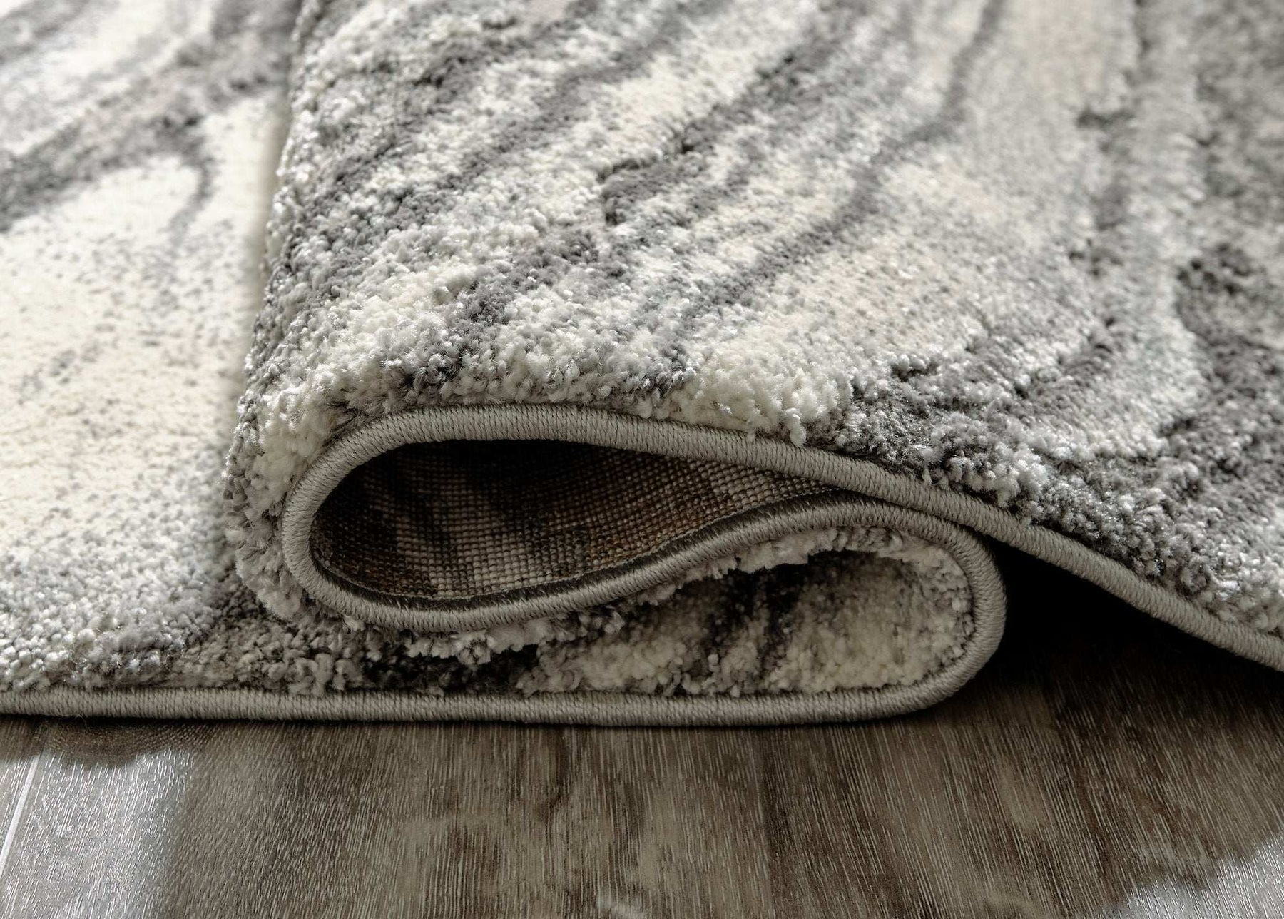 Wysdale 5'3" x 7'3" Rug - Half Price Furniture