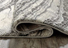 Wysdale 5'3" x 7'3" Rug - Half Price Furniture