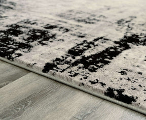 Zekeman 7'10" x 10' Rug Half Price Furniture