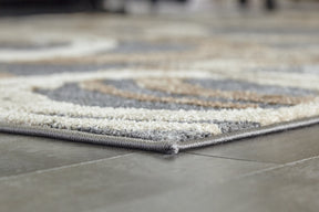 Faelyn 7'10" x 9'10" Rug - Rug - Half Price Furniture