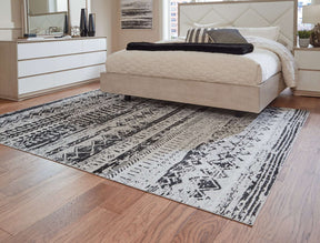 Devman 7'7" x 9'11" Rug Half Price Furniture