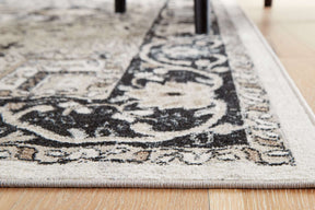 Gregmoore 5'2" x 6'10" Rug - Half Price Furniture
