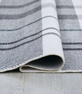 Kaidlow 7'5" x 9'6" Rug Half Price Furniture