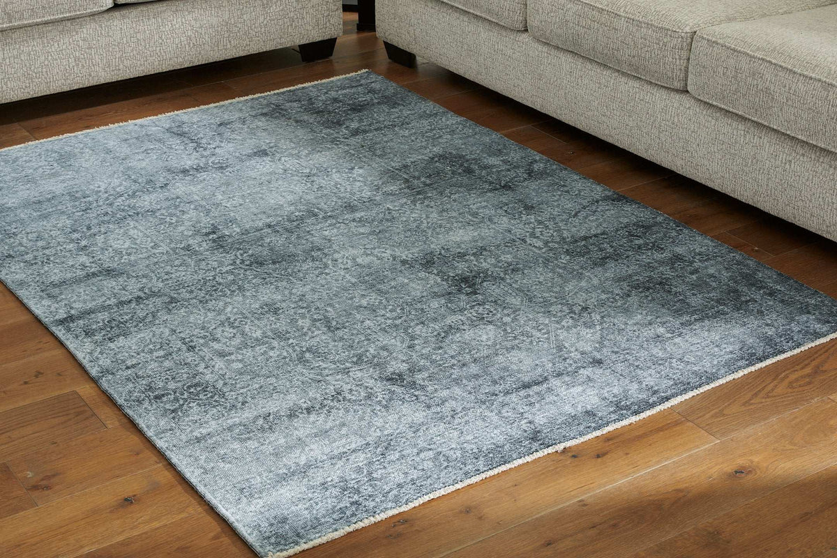 Rhysill 5' x 7' Rug Half Price Furniture