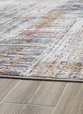 Rhettner 5'3" x 7'3" Rug - Half Price Furniture