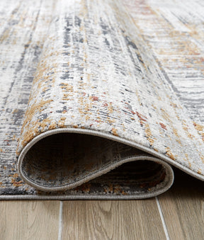 Rhettner 5'3" x 7'3" Rug - Half Price Furniture