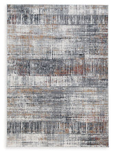 Rhettner 5'3" x 7'3" Rug Half Price Furniture