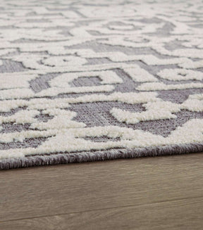 Oddetteley 7'10" x 10'1" Rug Half Price Furniture