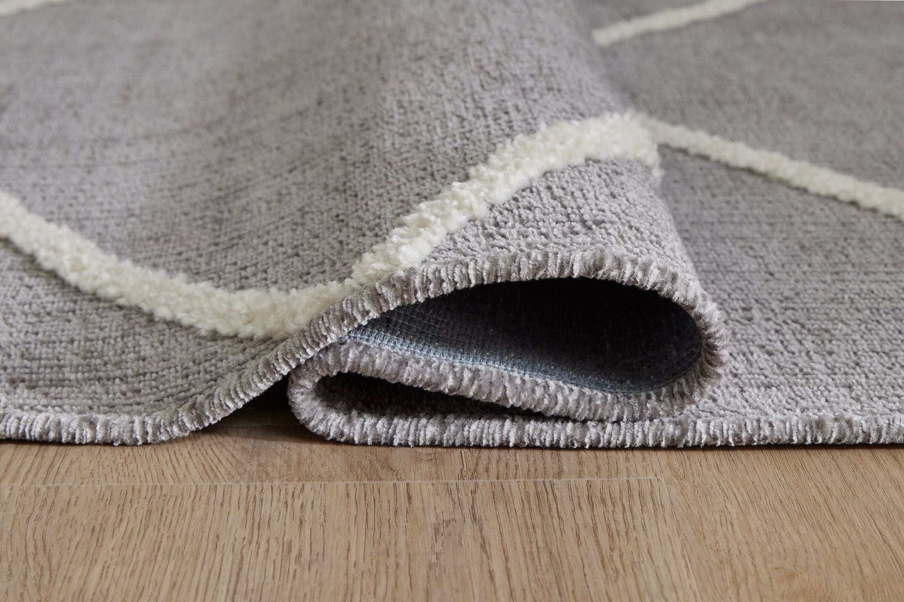 Stardo 4'11" x 7'2" Rug - Half Price Furniture