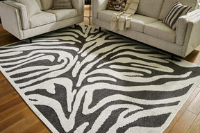 Thomwith 7'10" x 10'1" Rug Half Price Furniture