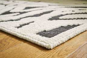 Thomwith 7'10" x 10'1" Rug Half Price Furniture
