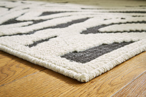 Thomwith 4'11" x 7'2" Rug - Half Price Furniture