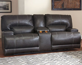 McCaskill Reclining Loveseat with Console Half Price Furniture