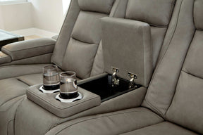The Man-Den Power Reclining Loveseat with Console Half Price Furniture